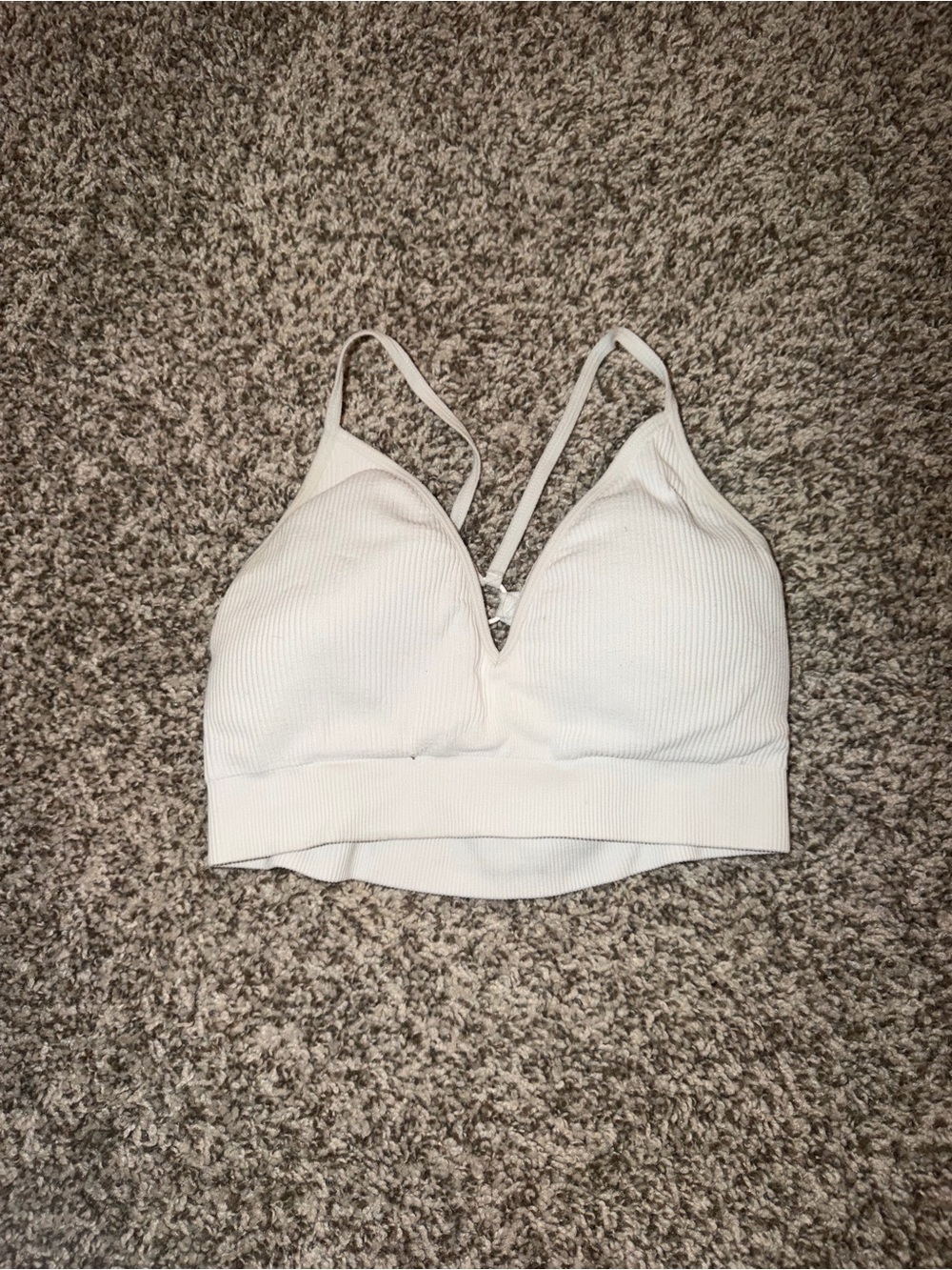 White NVGTN sports bra